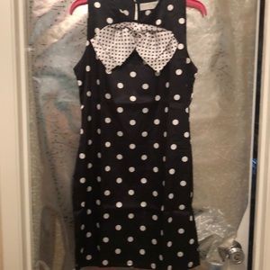Black and white polka dot sleeveless dress